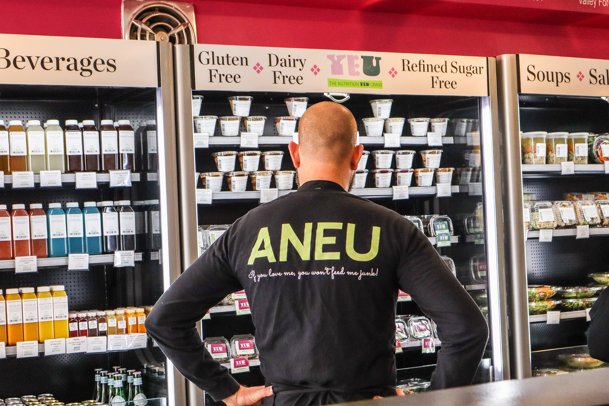 An ANEU host at a wedding bar setup